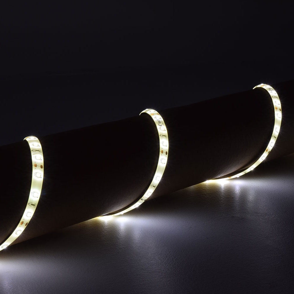 LYYT 12V LED strip light by AVSL wrapped around a dark cylindrical surface, emitting warm white light along the flexible silicone-coated tape.