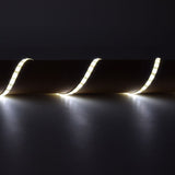 LYYT 12V LED strip light by AVSL installed along a curved surface, emitting warm white light in three looped sections against a dark background.