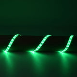 LYYT 12V LED Strip Light by AVSL installed in a wave along a wall, emitting vivid green IP65 waterproof illumination across the surface.