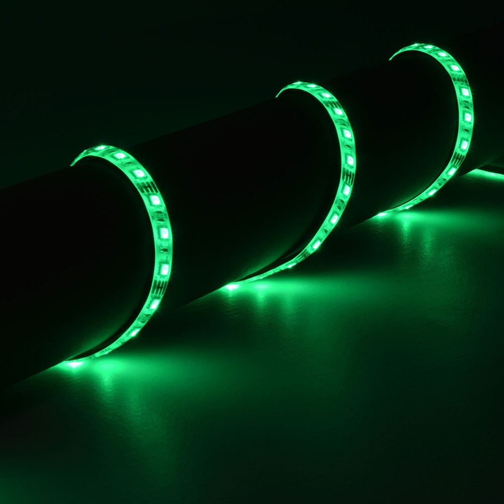 LYYT 12V LED Strip Light by AVSL wrapped around a dark pipe, glowing vivid green along the flexible IP65 tape with light spill on the surface.