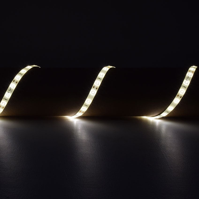 LYYT DIY-DW120 waterproof LED strip by AVSL, flexible tape curving across a dark surface, lit in warm white with a soft even glow.
