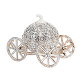 Crystal Pumpkin Carriage Hinged Metal Trinket Box in silver, with a crystal-studded rounded body, white stem top, and four spoked wheels, shown on a white background.