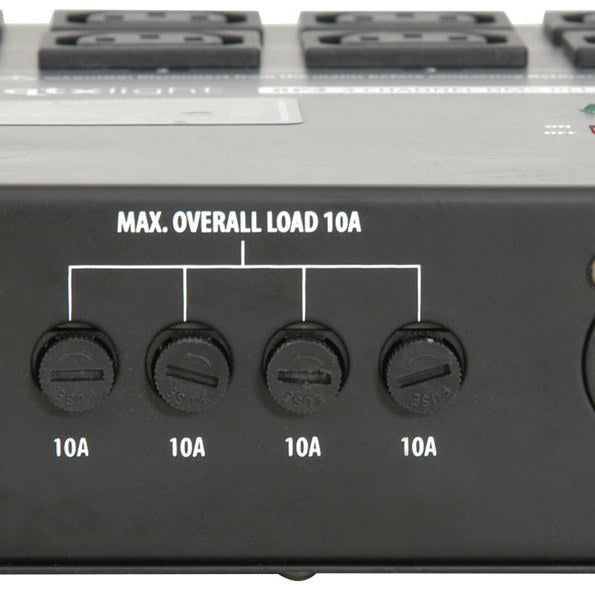 Close-up of the AVSL QTX RP4 4 Channel DMX Relay Pack front panel showing four 10A fuse holders beneath a Max. Overall Load 10A label.