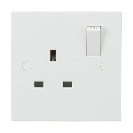 The 13A 1 Gang DP Switched Socket features a white square edge design, UK-style three-pin plug slot, and a switch in the on position. It incorporates anti-microbial technology for better hygiene and durability.