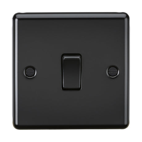 The 10AX 1 Gang Intermediate Switch in matt black showcases a central toggle on a smooth plate with a rounded edge design and is secured by two screws on either side.