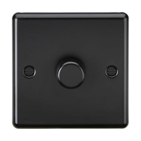 The 1 Gang 2 Way Intelligent Dimmer in Matt Black, featuring a rounded edge and precise control for LED lamps (5-150W), enhances modern interiors with its sleek design and two visible screws beside the central knob.