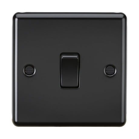 The 20A 1 Gang DP Switch in matt black features a sleek, rectangular design and is centered on a rounded metal wall plate. This double pole switch is securely held in place by two screws, while its glossy surface subtly reflects light, enhancing the elegant appearance of the setup.