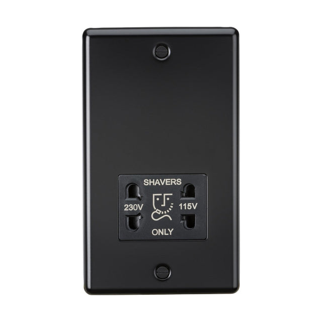 The 115-Dual Voltage Shaver Socket in matt black, designed for 230V and 115V with a Shavers Only label, has a rounded-edge plate with two screw holes and an IP41 rating for protection.