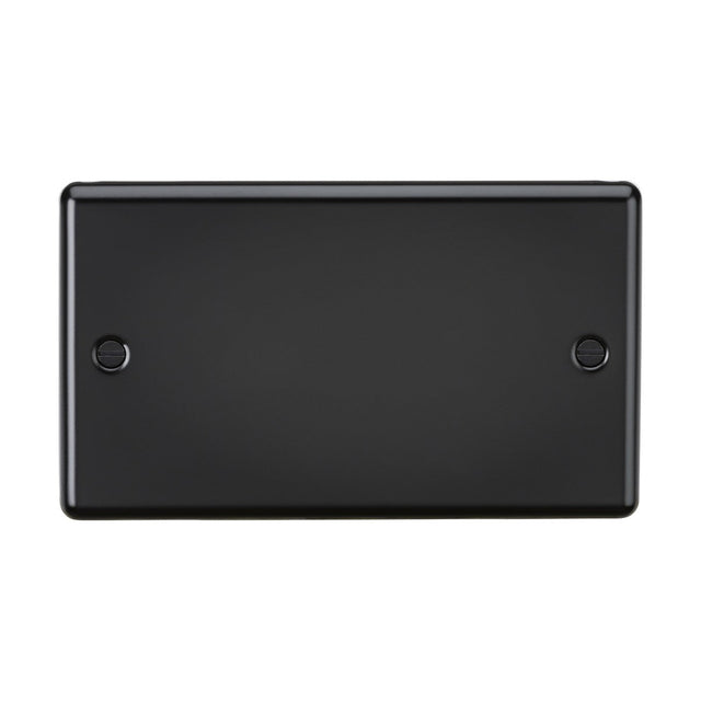 The 2 Gang Blanking Plate in Matt Black showcases a sleek rectangular design with a smooth, reflective finish and rounded edges. It features two horizontally centered screw holes on each side, exuding a touch of sophisticated matt black similar to premium grade steel.