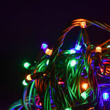 LYYT 90 LED heavy duty string lights coiled with glowing red, green, blue and amber bulbs on black rubber cable against a dark background.