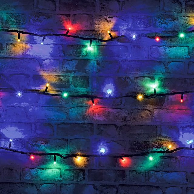 LYYT Heavy Duty Festoon Lights draped across a brick wall in three rows, showing red, green, blue and amber LEDs along black cable.