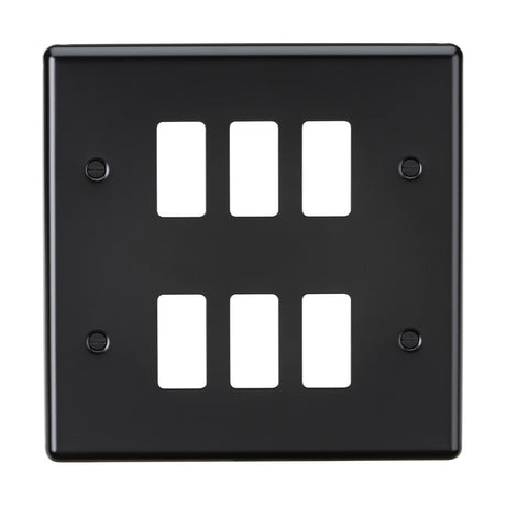 The 6 Gang Grid Faceplate in Matt Black showcases a sleek design with six rectangular openings arranged in two rows. It features four mounting holes at each corner and a smooth surface with a subtle sheen, merging efficiency with style.