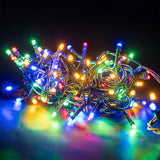 LYYT 200 LED RGBA string lights bundled on dark green cable, glowing red, green, blue and amber against a black background.