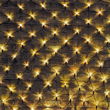 LYYT 240 LED net light with warm white bulbs on a black cable grid, draped across an exposed brick wall for outdoor decorative coverage.