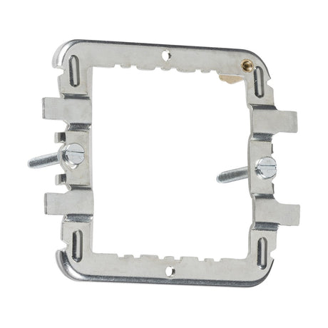 The 1-2 Gang Grid Mounting Frame For Flat Plate, Raised Edge & Metalclad is crafted from stainless steel with a rectangular opening and includes two screws on each side. Its textured silver finish makes it ideal for securely mounting electrical fixtures or devices.