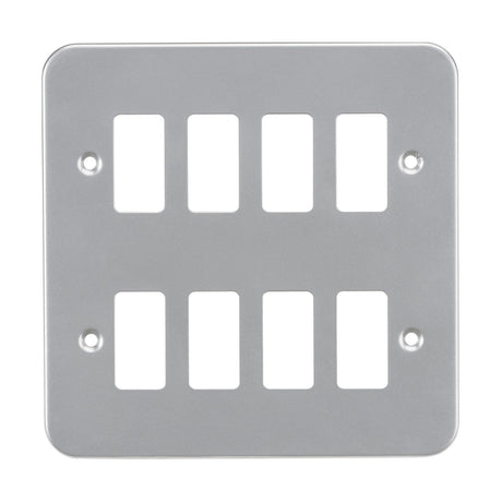 The Metalclad 8 Gang Grid Faceplate is a premium grade steel switch plate with eight rectangular openings arranged in two rows. Finished in Powder-coated Silver/Grey, it features four screw holes at each corner for secure mounting, offering a minimalist design that is both functional and stylish.