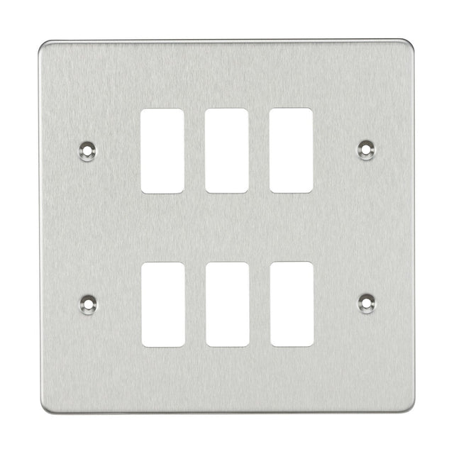 The Flat Plate 6 Gang Grid Faceplate in brushed chrome features six switch openings arranged in two neat rows. Made from premium-grade stainless steel, it includes four visible screws at each corner for secure mounting, enhancing both elegance and durability in your space.
