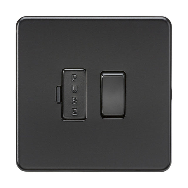 The 13A Switched Fused Spur Unit in matt black boasts a premium-grade steel body with a right toggle switch and left rectangular FUSE holder. Its screwless, sleek design enhances any space by blending style with functionality.