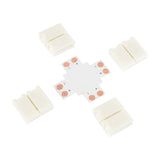 LYYT single colour LED strip X connector with cross-shaped PCB and four white snap-fit terminal clips on a plain background.