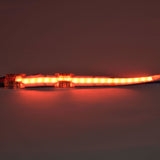 LYYT RGB COB LED strip connectors joining two 10mm strip sections, clear polycarbonate housings illuminated in red against a dark background.
