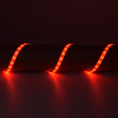 LYYT 12V Red LED Strip Light 5m by AVSL, IP65-rated tape with 60 LEDs per metre shown draped in three glowing loops against a dark surface.