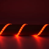 AVSL LYYT 12V RGB LED strip light draped in a wave over a cylindrical surface, glowing red across three visible loops against a dark background.