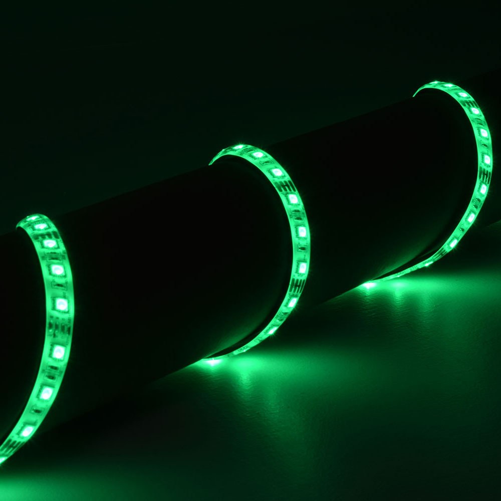 AVSL LYYT 12V RGB LED strip light wrapped around a dark cylindrical surface, illuminated in green along the flexible IP65 tape.