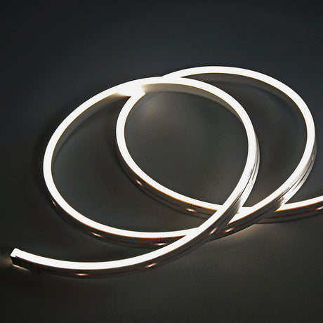 LYYT SideBend NW 30m IP66 side-bend LED tape by AVSL, coiled and illuminated in natural white 4000K light against a dark grey background.