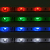 AVSL LYYT 24V RGB LED strip lights shown lit in red, green, blue and white across four 5m IP65 tape sections on a dark background.