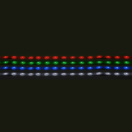 A photo showcasing the LYYT 24V RGB LED Strip Light 5m - 30 LED/m, featuring four rows of brightly lit segments against a black backdrop. The first row glows red, followed by green, blue, and white—demonstrating its energy efficiency and vivid illumination.