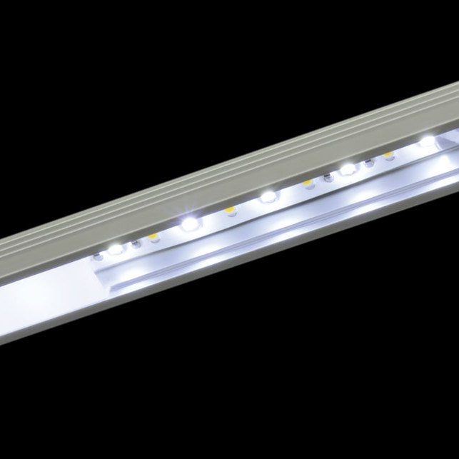 LYYT Deep Section Surface Mount LED Profile by AVSL, a 2m silver aluminium extrusion with illuminated LEDs visible along the opal diffuser channel.