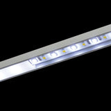 LYYT 2m shallow section surface mount LED profile by AVSL, aluminium extrusion shown illuminated with lit LED tape visible through the frosted diffuser strip.