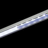 LYYT 45° surface mount LED corner profile by AVSL, aluminium extrusion with illuminated LED strip visible through the clear diffuser channel.
