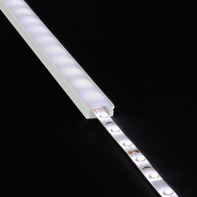 LYYT Short Crown 2m surface mount LED profile with lit LED strip partially inserted into the frosted aluminium extrusion, shown on black.