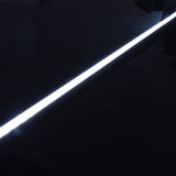 LYYT Tall Crown 2m surface mount LED profile by AVSL, illuminated diagonally with a bright crowned diffuser glowing against a black aluminium body.