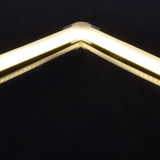 LYYT 90° Arc corner connector by AVSL joining two illuminated LED strip profiles at a right angle, showing the continuous warm light band across the bend.