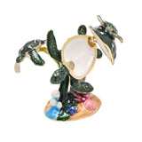 Coral Turtle Metal Trinket Box in green with hinged shell lid, featuring two baby turtles, a starfish and seashell on a sandy base, shown open on a white background.