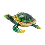 Sea Turtle Hinged Metal Trinket Box with Gold Trim in Green, featuring a jewelled shell with clear stones and gold edging, shown on a plain white background.