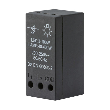 The 40-400W (3-100W LED) Leading Edge Dimmer Module is a black rectangular relay switch with white text, designed for use with 200-250V, 50/60Hz systems. It is suitable for dimming applications ranging from 3-100W LEDs to lamps at 40-400W. The module complies with BS EN 60669-2 standards and has an IP20 rating, featuring three connection ports labeled L1, L2, and COM.