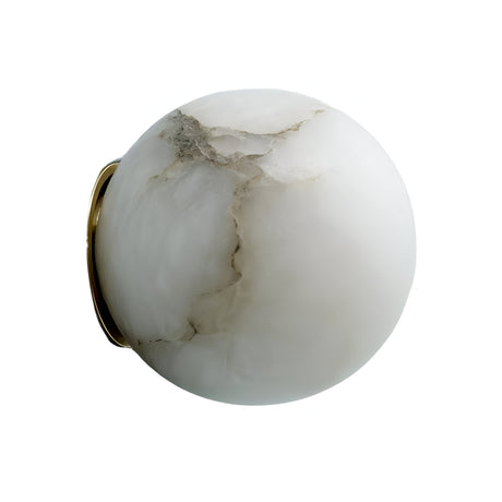The Alviora 1 Light Large Circular Stone Alabaster Wall Light features a smooth white marble sphere with subtle gray veining and a small brass accent, set against a plain white background.