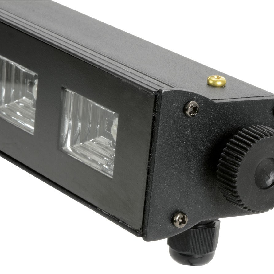 Close-up of the QTX UVB-9 UV LED Bar by AVSL, showing the matte black metal housing end with mounting knob, cable gland, and two LED lens windows.
