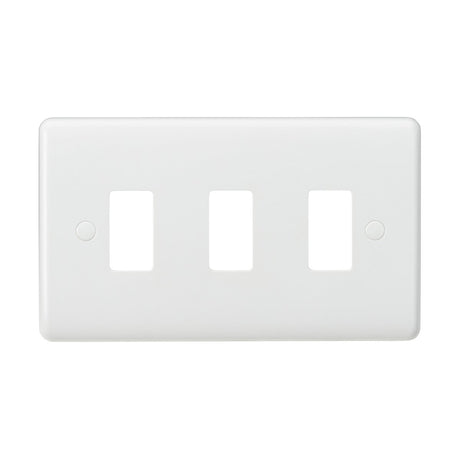 The 3 Gang Grid Faceplate is a white triple rocker switch plate with a curved edge design and three rectangular openings. Made from thermoset resin, it offers a simple and minimalistic look, perfect for covering three light switches.