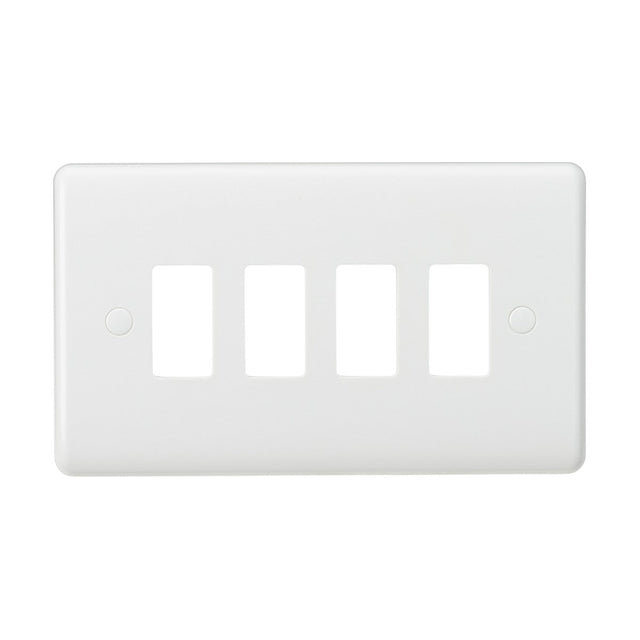 Presenting the 4 Gang Grid Faceplate by Knightsbridge, a sleek white wall plate with four rectangular openings for light switches. This modern design piece is crafted from durable thermoset resin, featuring a smooth surface and equipped with two small screw holes for easy mounting.