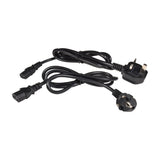Two black IEC power cables coiled with UK three-pin and European Schuko plugs, supplied with the QTX Stratus 1200 fog machine, on a white background.