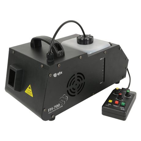 Introducing the QTX FH-700 Mini Fog-Haze Machine - 700W, available in sleek black. It features a user-friendly control panel equipped with buttons and sliders, alongside a handy remote control for easy operation. This machine comes with a durable handle, an indicator light, and a cautionary label, making it expertly crafted for creating spectacular fog effects.