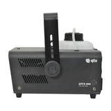 Side view of the QTX QTFX-900 fog machine in matt black with folding carry handle, ventilation slots, and translucent 1.3L fluid tank on top.