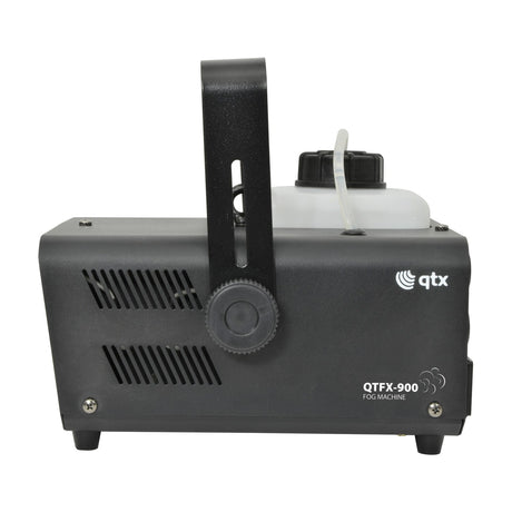 Side view of the QTX QTFX-900 fog machine in matt black with folding carry handle, ventilation slots, and translucent 1.3L fluid tank on top.