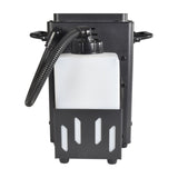 Side view of the QTX VertiBox compact vertical LED fog machine by AVSL, showing the removable white 1.2 litre fluid tank, ribbed hose and folding carry handles.