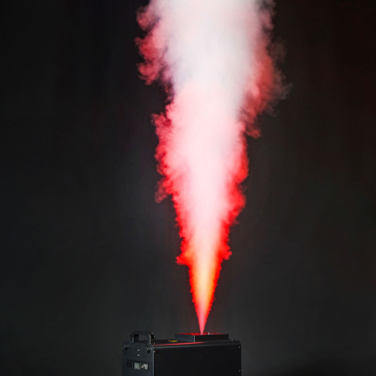 QTX Harrier-1500 LED fog jet machine by AVSL shooting a tall vertical plume of red-lit smoke against a black background.