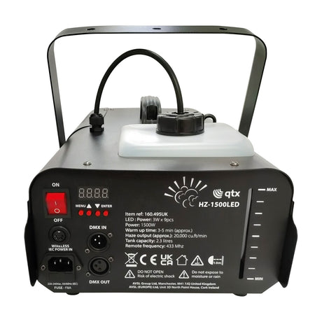 Rear view of QTX HZ-1500 LED 1500W fog machine in matt black steel with power switch, display, DMX in/out, IEC inlet and side fluid level window.